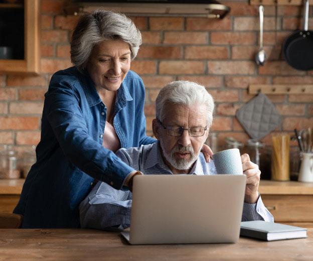 Couple looking at a computer
